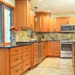 kitchen design with warm wood cabinetry
