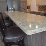 kitchen peninsula with quartz countertop