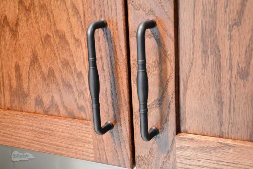 kitchen cabinet with black hardware