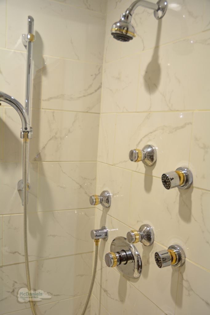 bath design with multiple showerheads