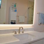 bath vanity with backlit mirror