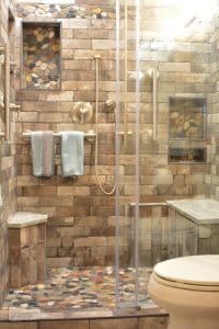 shower with textured tile in different shades of brown and beige