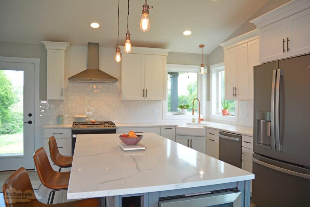kitchen with exposed bulb pendants