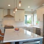 kitchen with exposed bulb pendants
