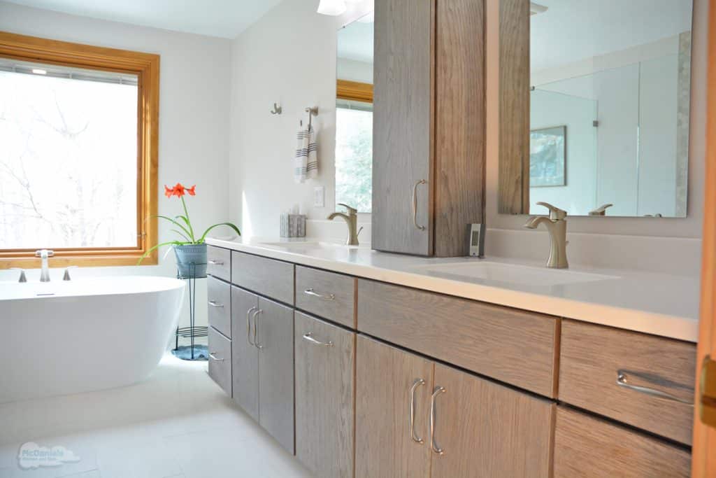 bath design with wood vanity
