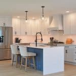 white kitchen cabinets and blue island cabinetry